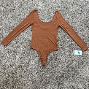 Dress Forum Tan Ribbed Long Sleeve Bodysuit